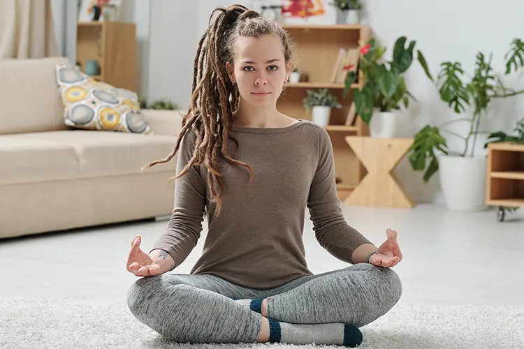 A calm, softly lit space set up for meditation and relaxation